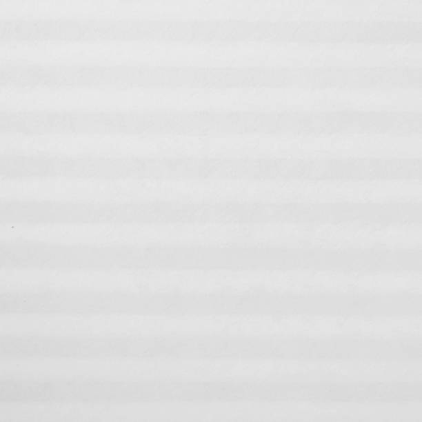 istock White striped pattern on mulberry paper textured background, detail close-up 825593390