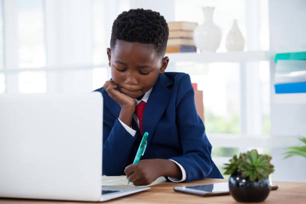istock Businessman writing on paper 825594216