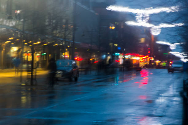 istock Blurred street in the rain 825596592