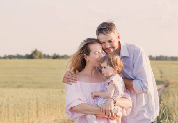 istock happy family outdoor 825596918