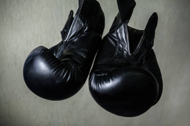istock Boxing gloves in fitness studio 825597338