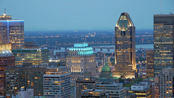 montreal downtown by night, view from mount-royal, quebec, canada. - lawrence quebec canada north america imagens e fotografias de stock