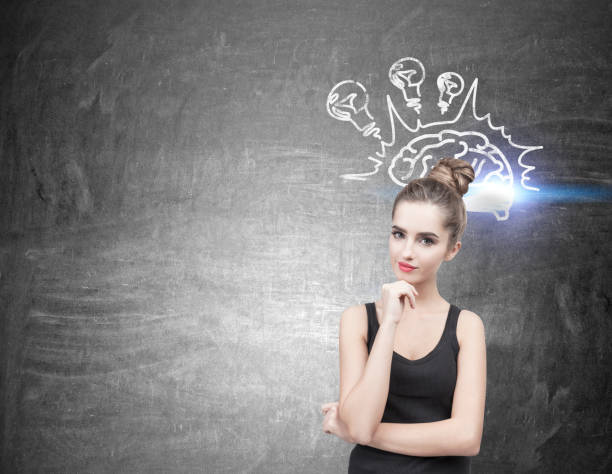 istock Pensive woman in a black tank top, brain bulbs 825620634