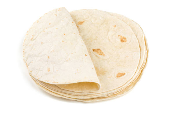 istock wheat tortillas isolated on white 825624172