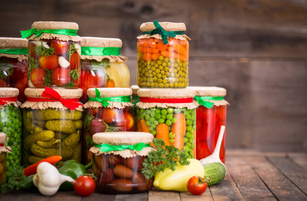 istock Preserved vegetables in the jars 825635538