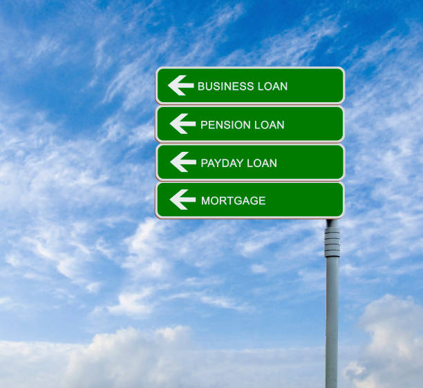 istock Road sign to loans 825636444