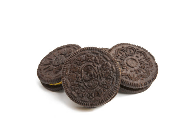 istock Chocolate cookies with cream filling 825636720