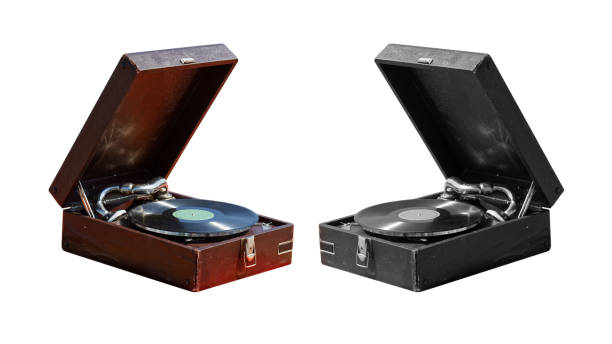 istock Old vintage gramophone suitcase isolated on white 825645148