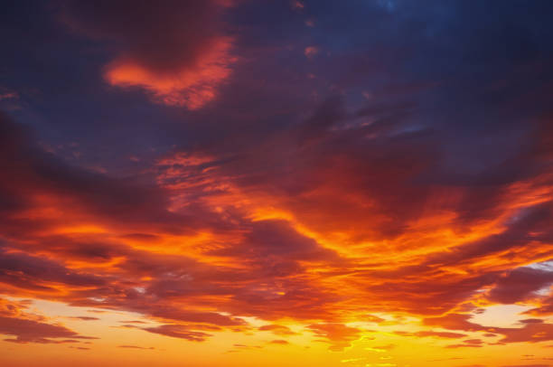 istock Fiery, orange and red colors sunset sky. Beautiful background 825655356