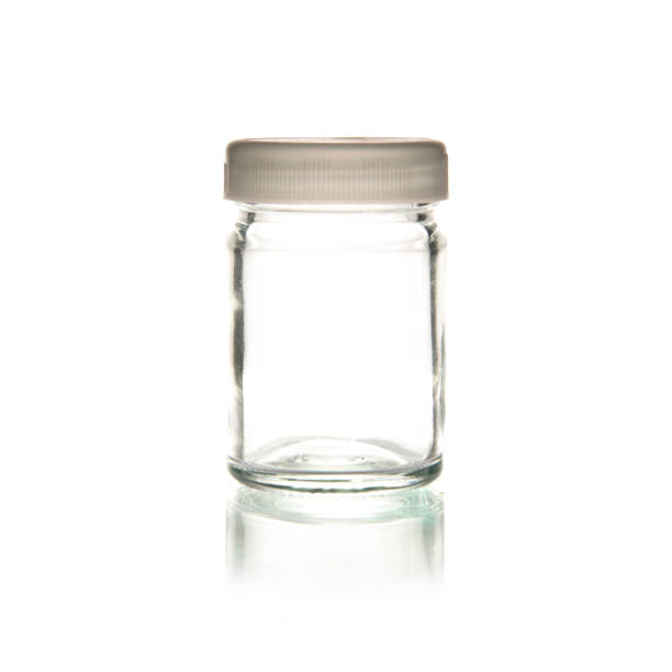 istock Glass bottle with lid isolated on white background . 825662052