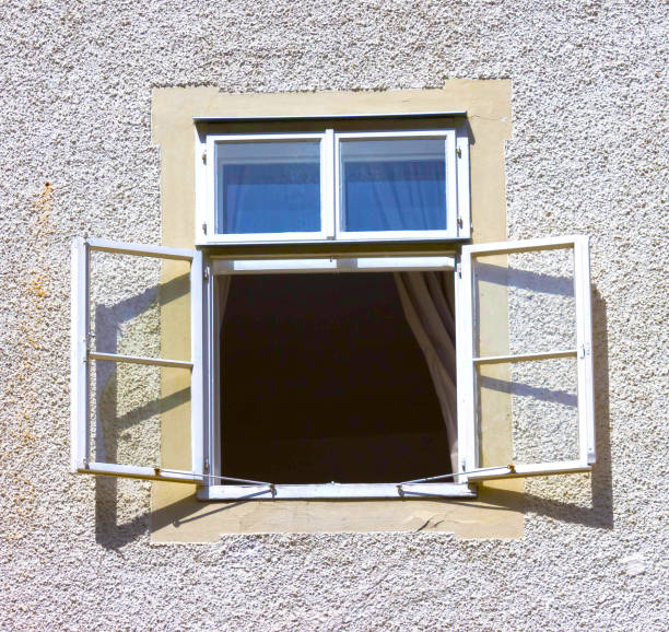 istock The typical view of a window with open shuttersin 825662866