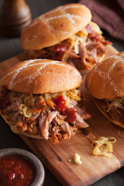 istock homemade pulled pork burger with caramelized onion and bbq sauce 825669736