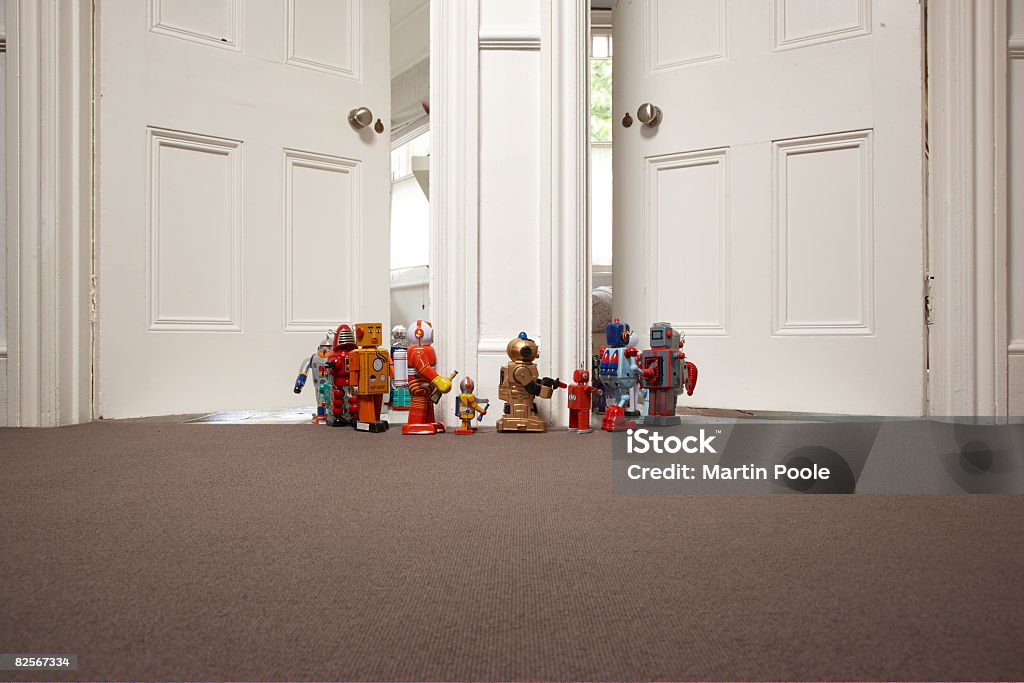 toy robots going from one room to another  Toy Stock Photo