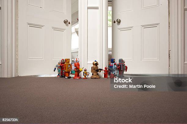 Toy Robots Going From One Room To Another Stock Photo - Download Image Now - Toy, Escaping, Domestic Room