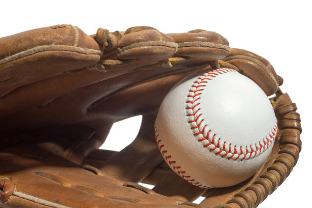 istock Old worn leather baseball glove and used ball 825673406