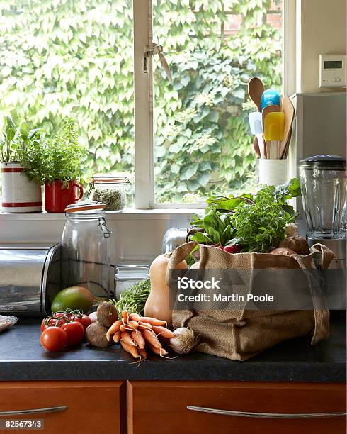 Fresh Vegetables In Canvas Bag On Kitchen Counter Stock Photo - Download Image Now - Groceries, Vegetable, Bag