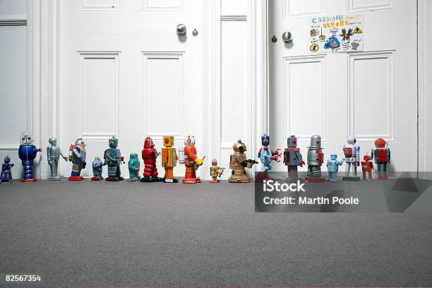 Toy Robots Lined Up Outside Childs Bedroom Stock Photo - Download Image Now - Toy, Robot, Order