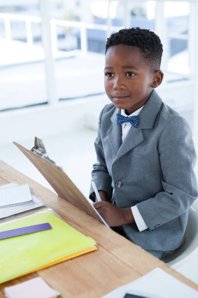 istock Thoughtful businessman sitting on chair 825673592