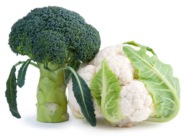 istock Fresh Broccoli and Cauliflower isolated on white 825673680