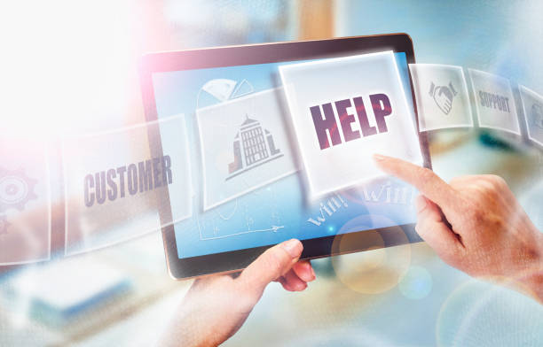 istock A businesswoman selecting a Help business concept on a futuristic portable computer screen. 825680418