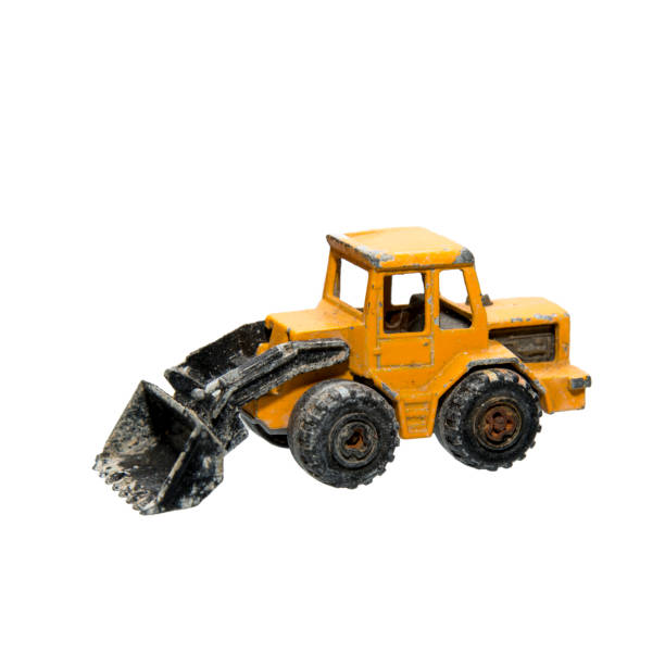 istock Isolated bulldozer toy on white background. 825682626