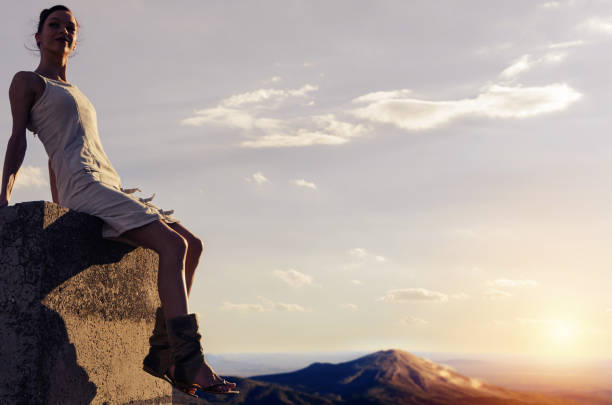 istock girl relaxing near volcano eruption 825685706
