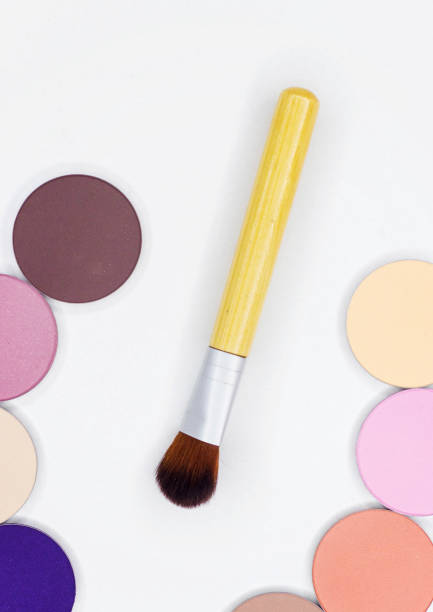 istock A new brush and eye shadow on white. 825685888