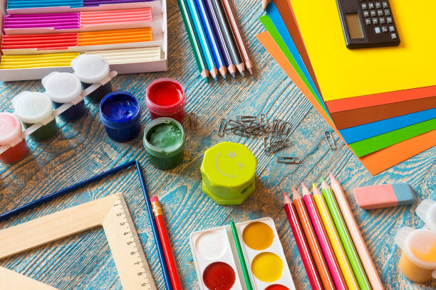 istock School supplies on a blue background 825688866