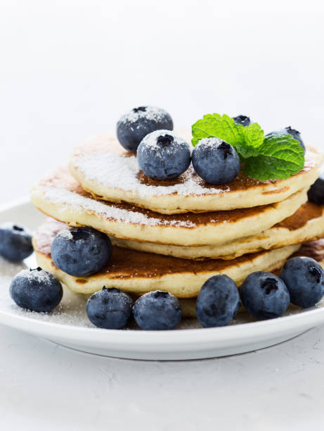 istock Blueberry buttermilk pancakes on white plate 825696442
