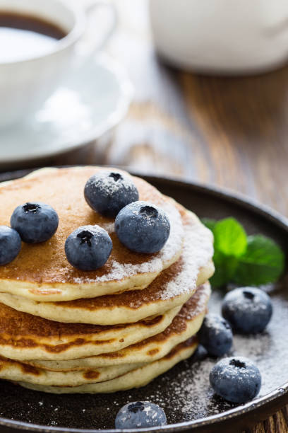 istock Blueberry buttermilk pancakes in cast iron pan 825696560