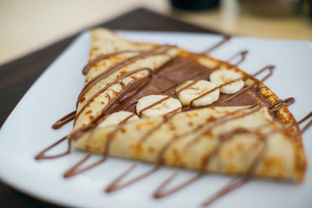 Crepes filled with Banana and Chocolate Hazelnut Spread