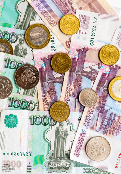 istock Russian money background. Rubles banknotes and coins 825715438