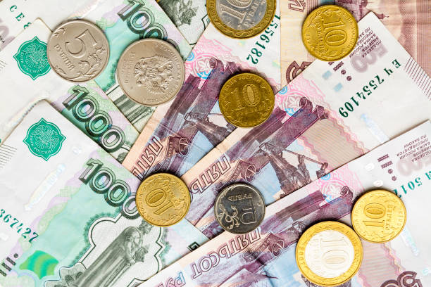 istock Russian money background. Rubles banknotes and coins 825717736