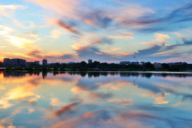istock Beautiful colored after sunset sky reflects in water. 825718994