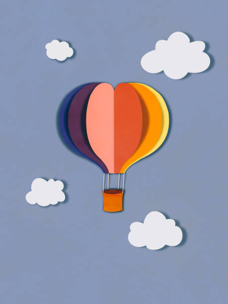 Flying balloon in clouds, paper cutting style