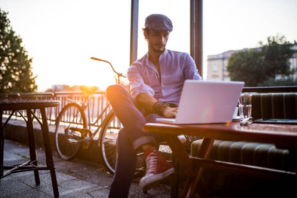 istock Working on a laptop in the cafe 825721506
