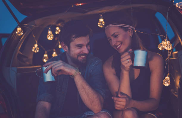 istock Hipster couple on roadtrip 825722420