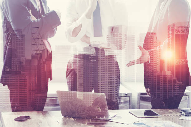 istock Group of business people working with technology. 825725710