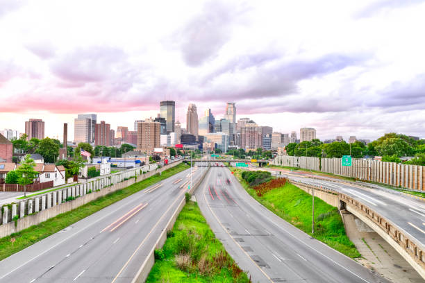 istock Minneapolis Skyline and Traffic Light Trails 825734410
