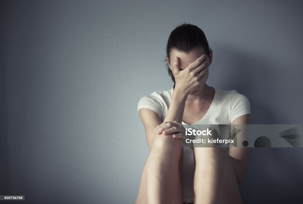 Stressed woman Young woman feeling stressed and depressed Teenage Girls Stock Photo