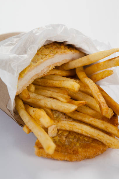 French fried chips in a take away paper bag