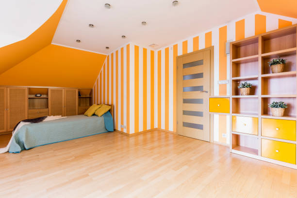 istock Energetic bedroom in orange and white 825737966