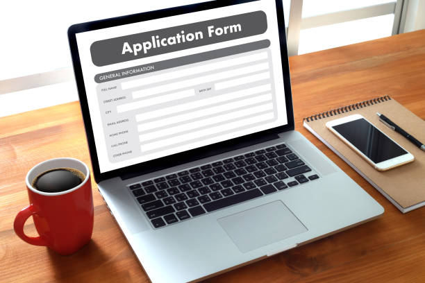 istock business man working on laptop computer use Online Web Job Application Form moniter 825742264