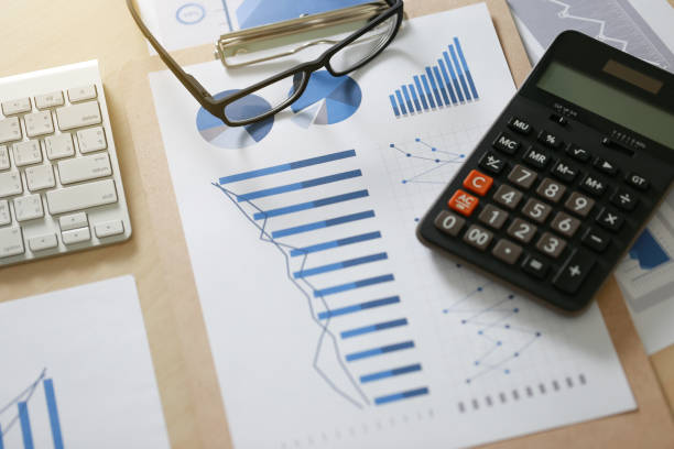 istock Checking financial reports paperwork and Business  Teamwork on table calculating or checking balance 825742364