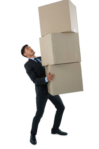 istock Full length businessman carrying cardboard boxes 825754352