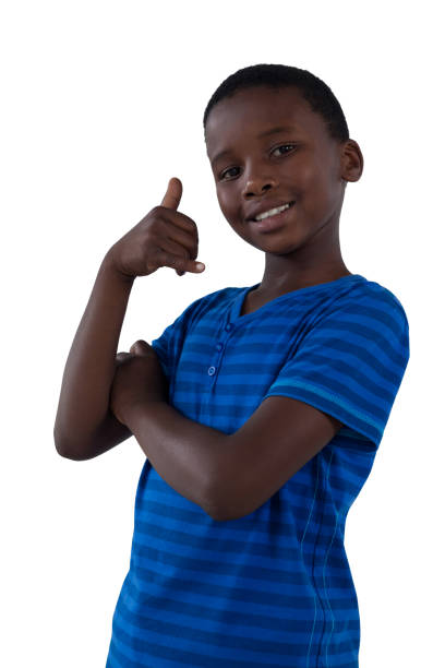 istock Cute boy pretending to talk on a cell phone 825757686