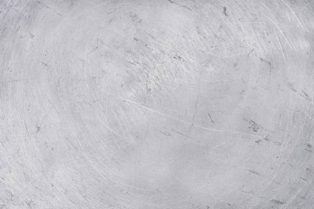 istock aluminium texture background, scratches on stainless steel. 825758636