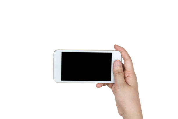 istock Hand holding mobile phone with blank screen isolated on white background 825761372