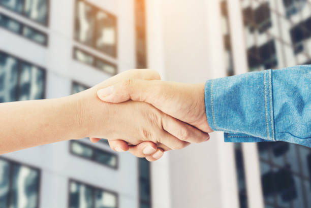 istock Handshake of businessman 825761412