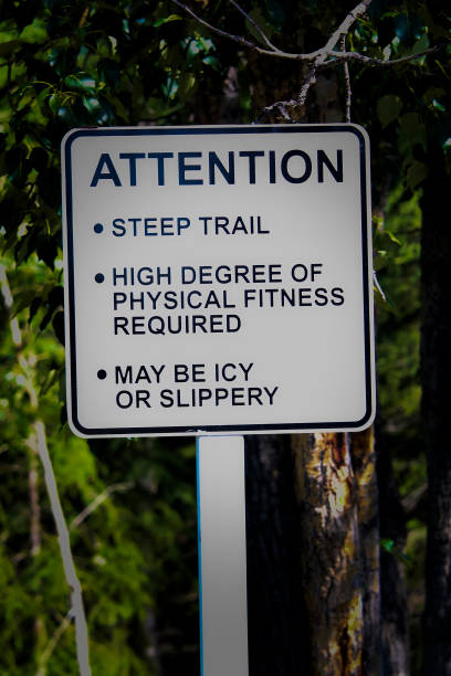 istock An attention steep trail sign with additional warnings 825766130